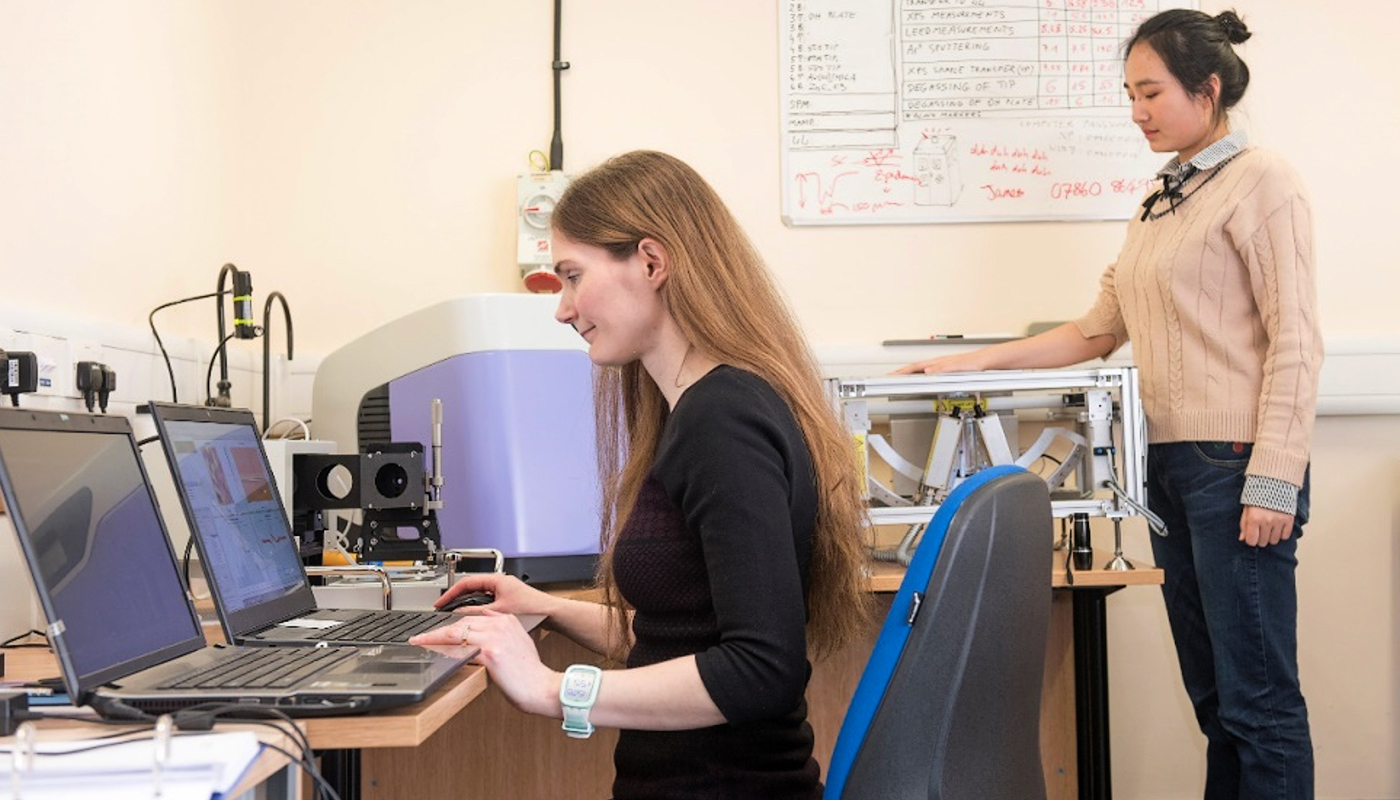 Biological sample rests on a platform for screening. The imaging system developed by Prof. Emma MacPherson <em>(left)</em> can detect skin cancer by its different hydration profile